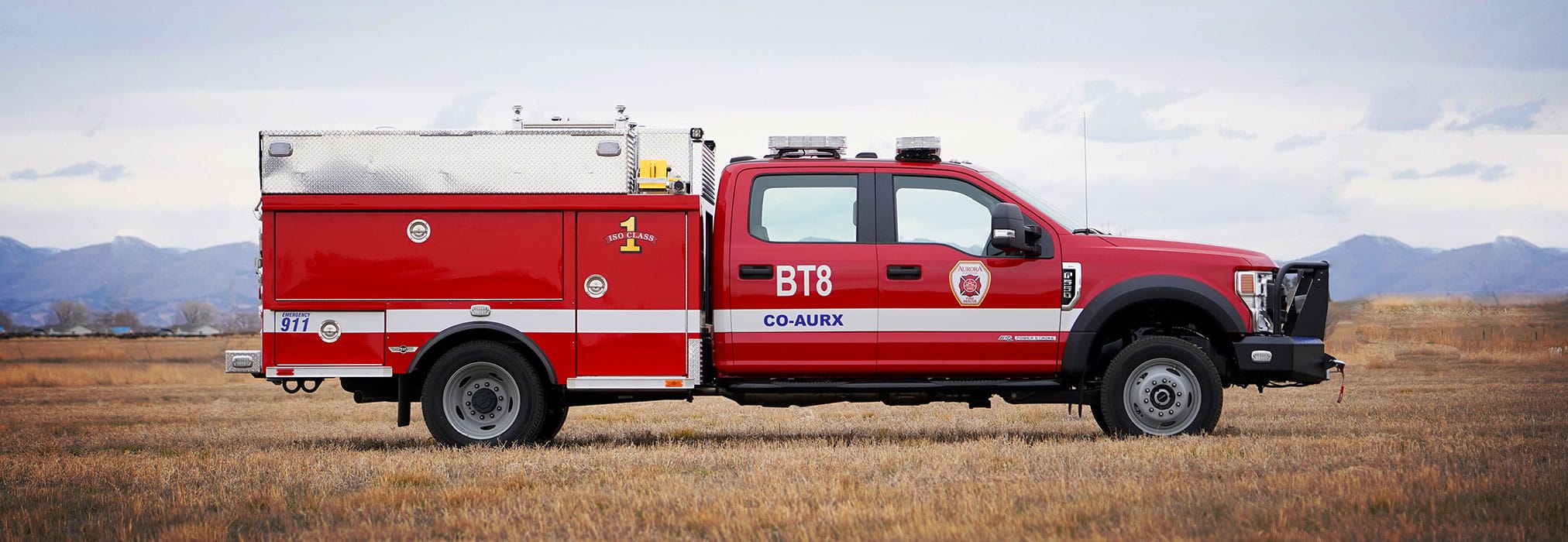 curb side view of Aurora's type 6 brush fire truck