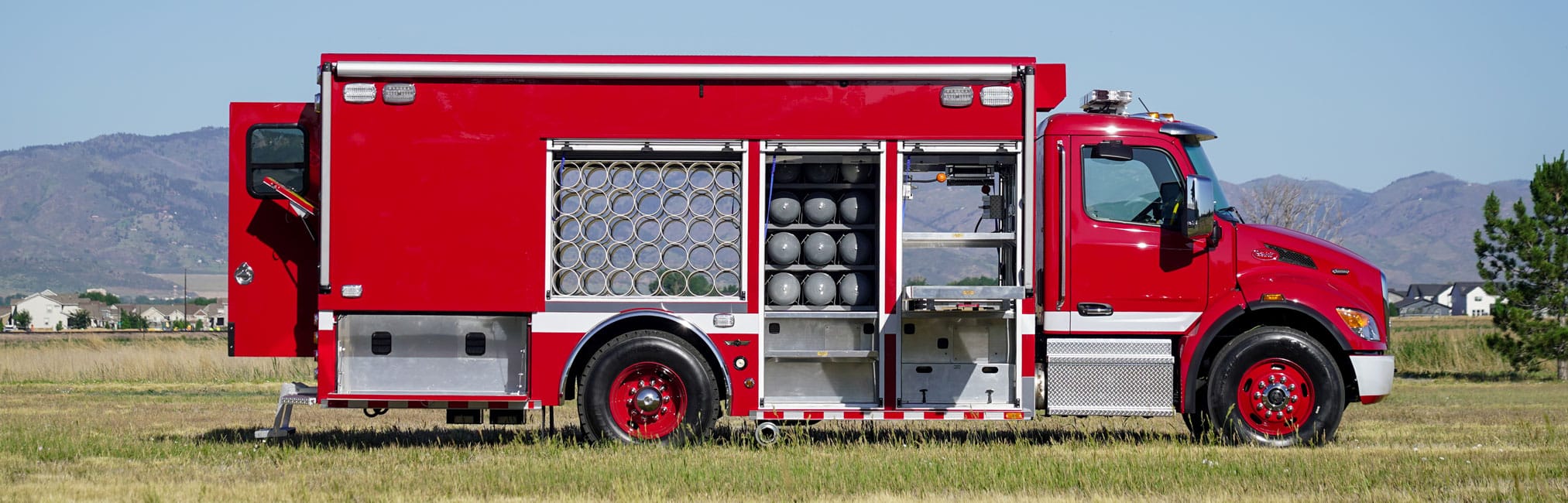 curbside view of Cleveland Fire Department Air/Light fire truck with mobile SCBA filling station